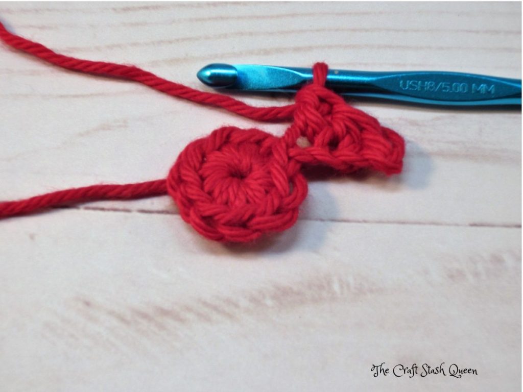 One double crochet in next chain.  Last step in first spoke of crochet star applique.