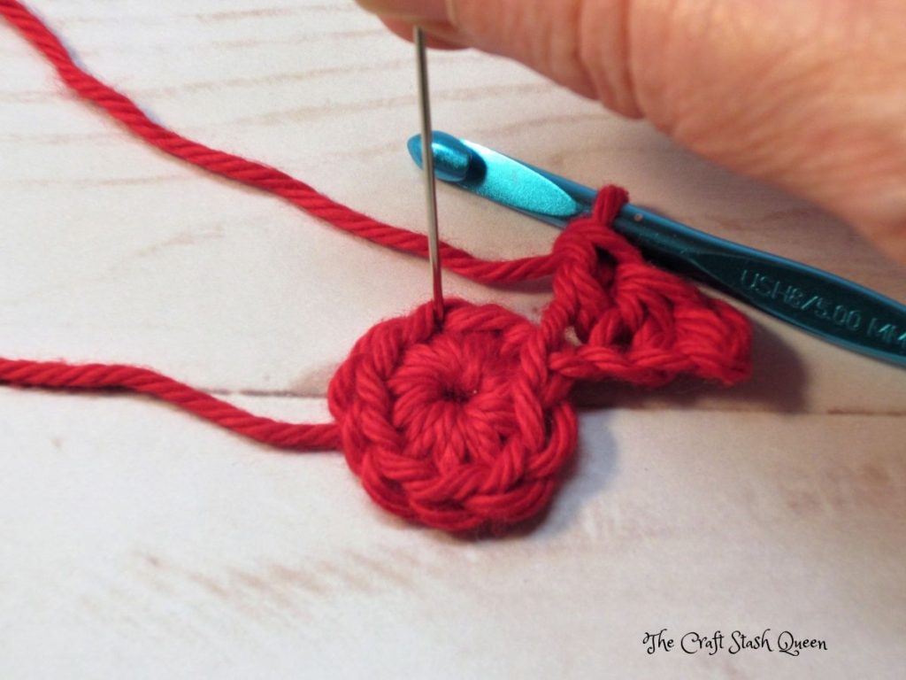 Pin indicating where to insert crochet hook and make a slip stitch.